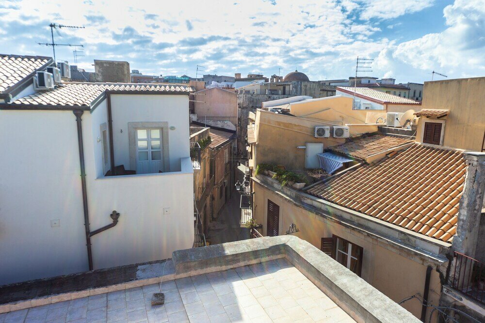 Фото Mercato di Ortigia Apartments