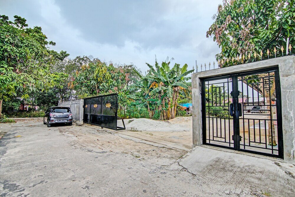 Фото Oyo 92223 Alfatar Homestay Syariah