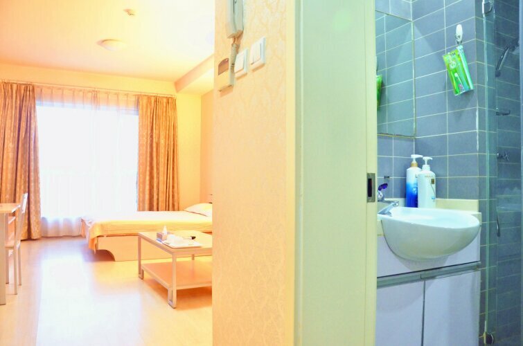 Фото China Sunshine Apartment Dacheng International