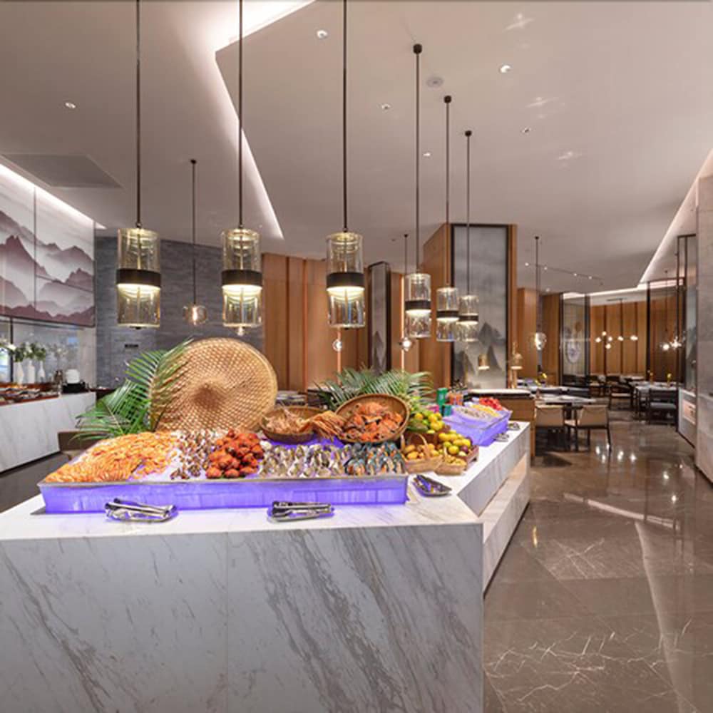 Фото New Century Hotel Zhenhai