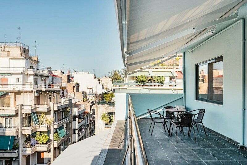 Гостиница Sanders Home Suites - Cheerful Downtown Studio в Афинах