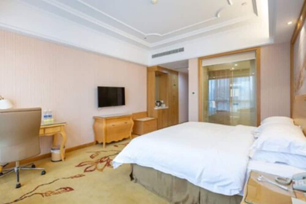 Фото Vienna International Hotel - Ningbo City West Xintiandi