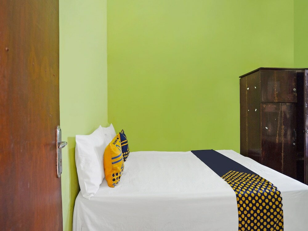 Фото Spot On 91869 Insan Mulia Kost Syariah