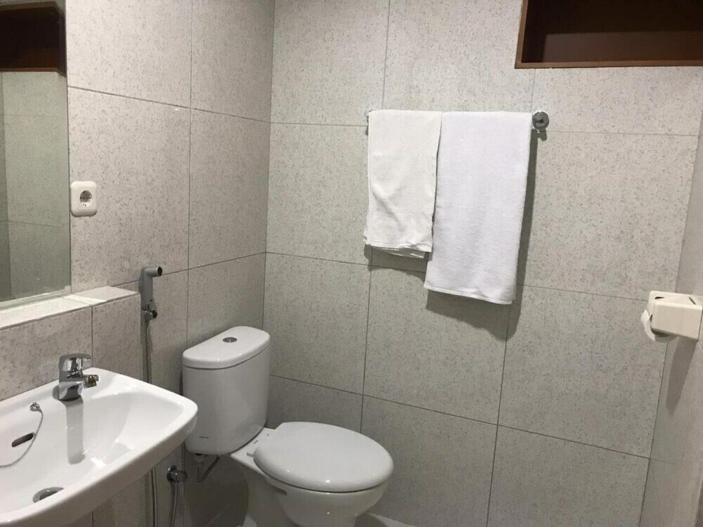 Фото The Sarining Hotel