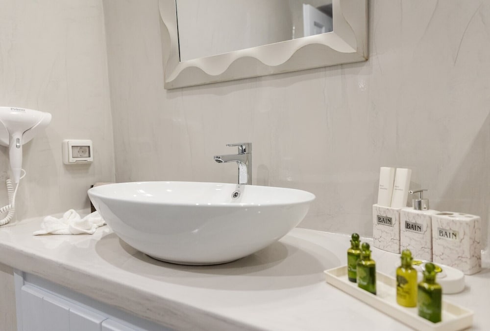 Фото Sun Angelos Oia - Luxury Cave Suites