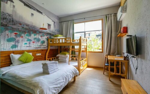 Гостиница Bajie Youth Hostel National Forest Park