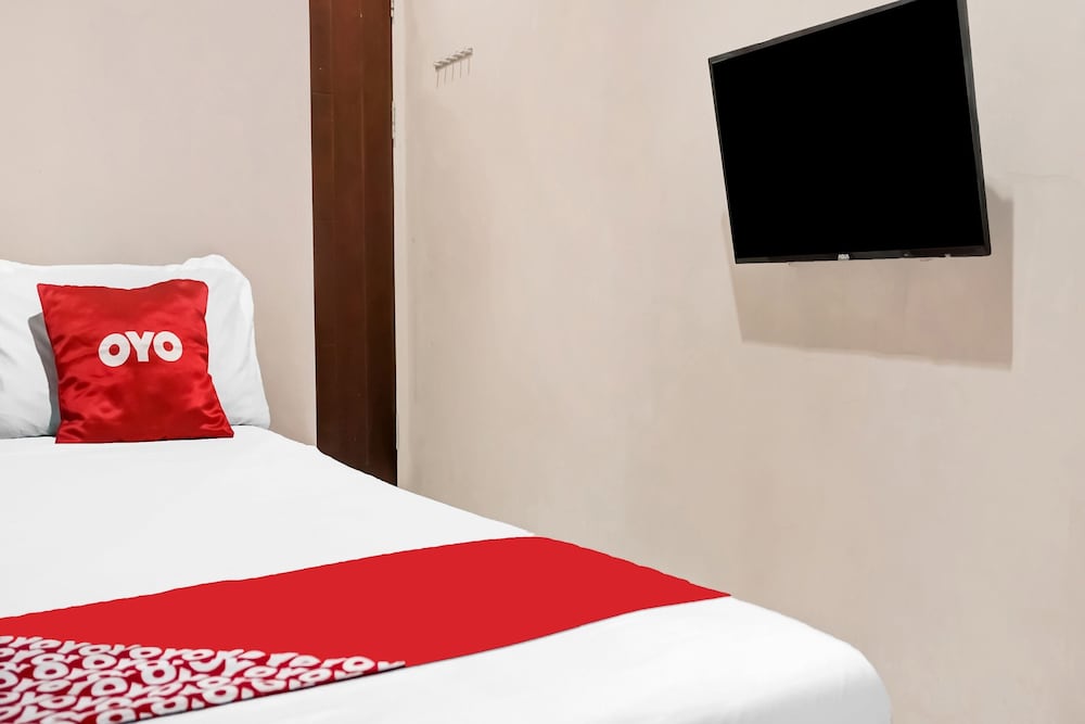 Фото Spot On 91336 Guesthouse Tarumanegara