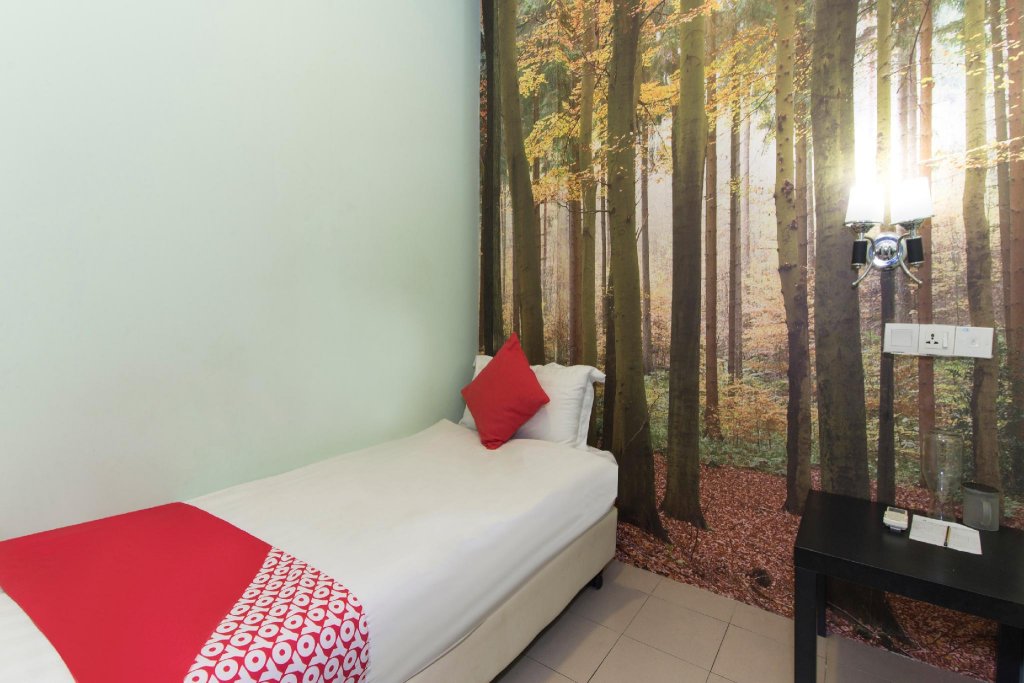 Фото Oyo 476 Rain Forest Hotel