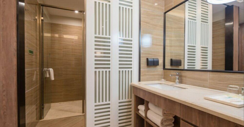 Фото Auden International Hotel