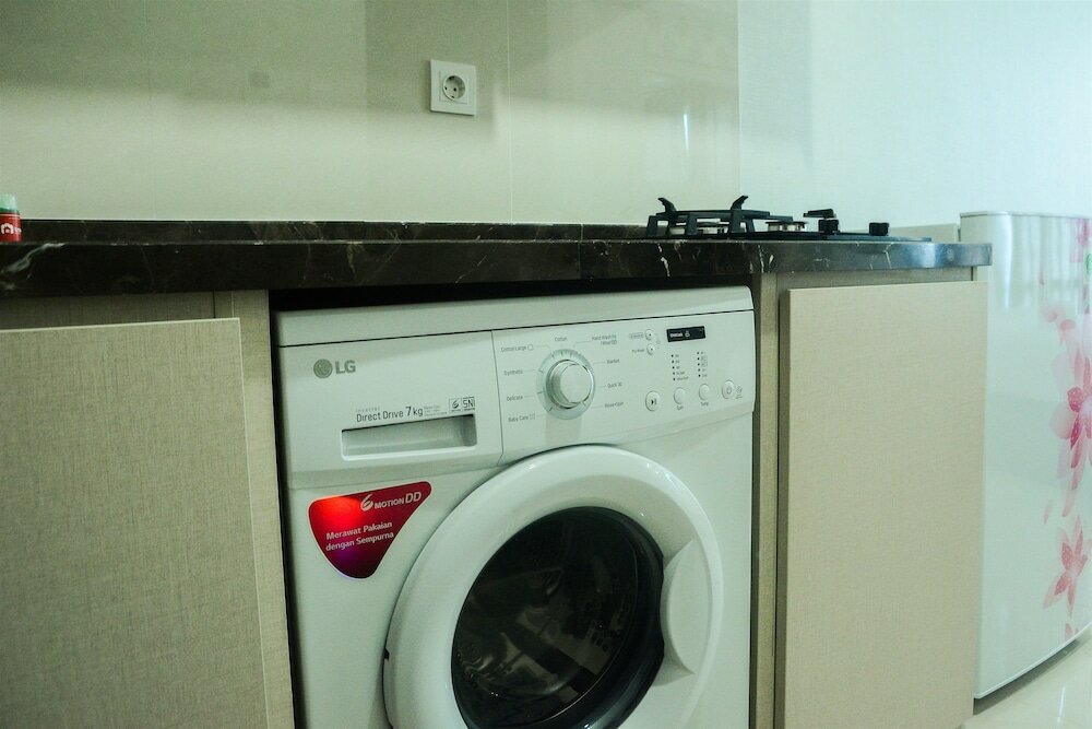 Фото Modern City View Studio Apartment at Puri Mansion