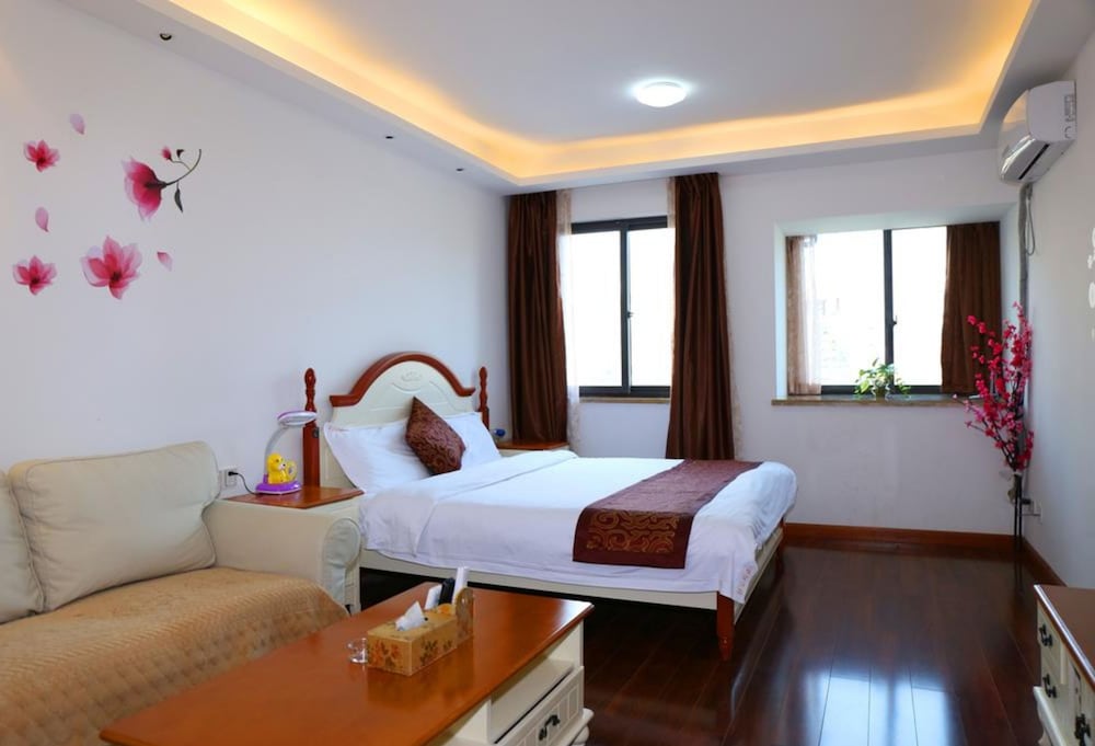 Фото Yue Ke Apartment