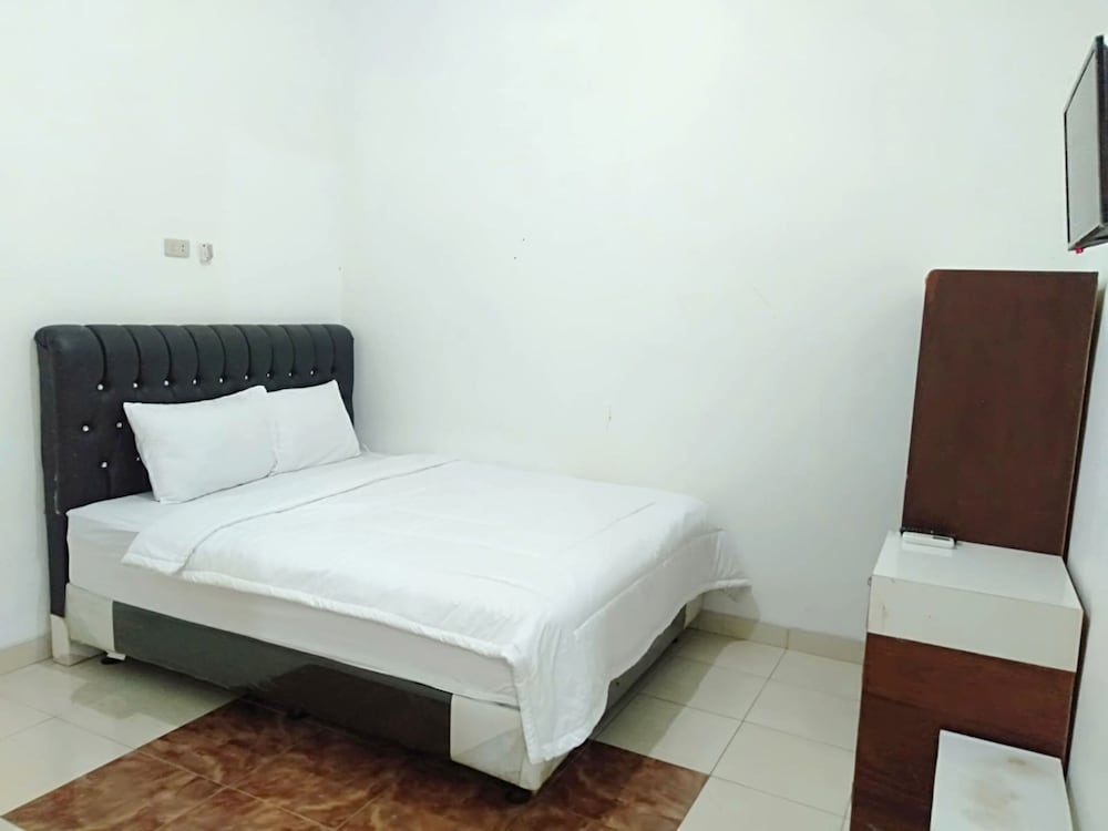 Фото Oyo 92596 Al-razzaq Guest House