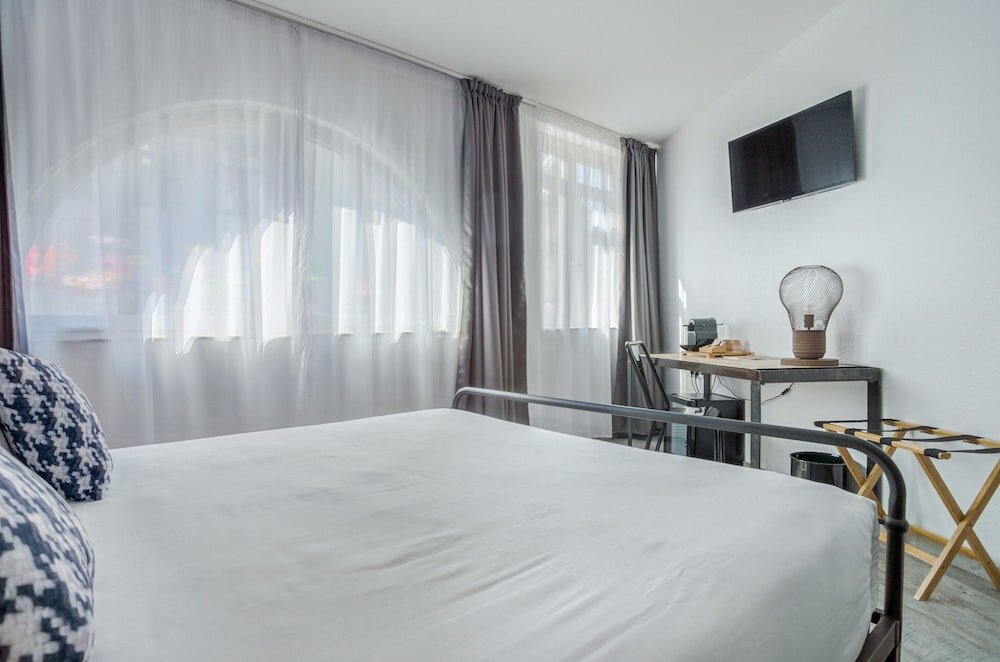 Фото La Maison Hotel Mulhouse