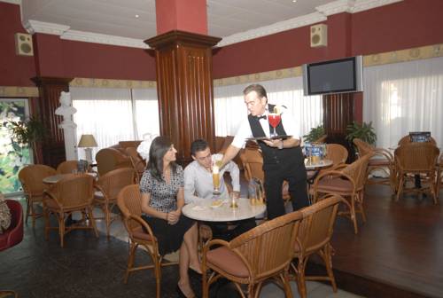 Фото Playacapricho Hotel