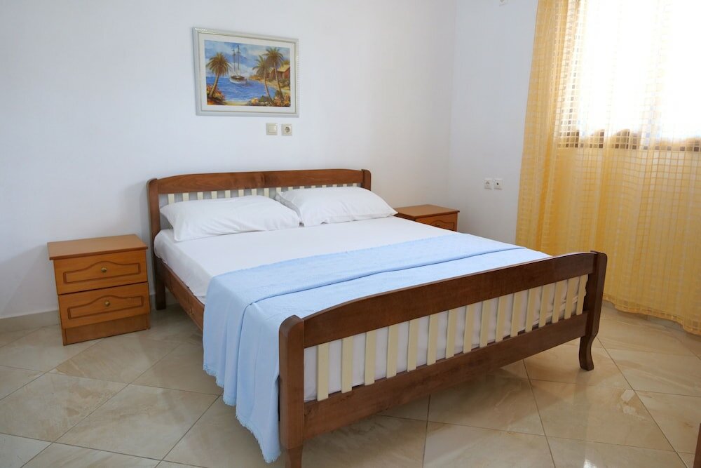 Фото Pellumb Apartments