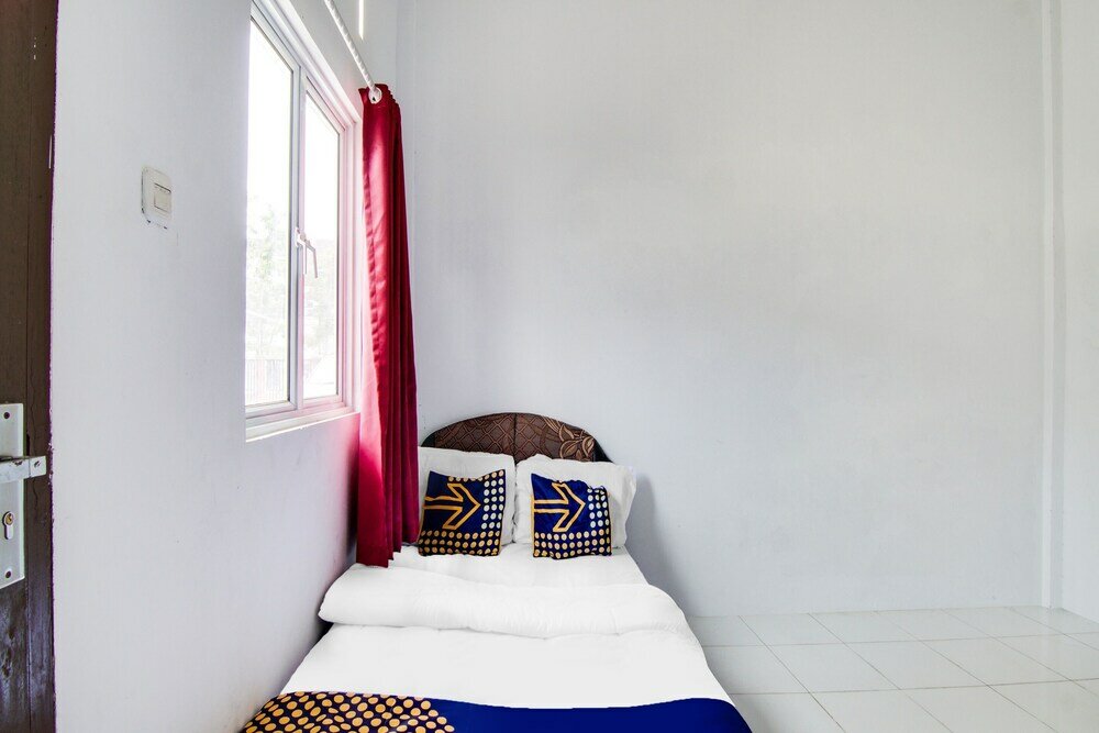 Фото Spot On 91858 Raja Homestay Syariah