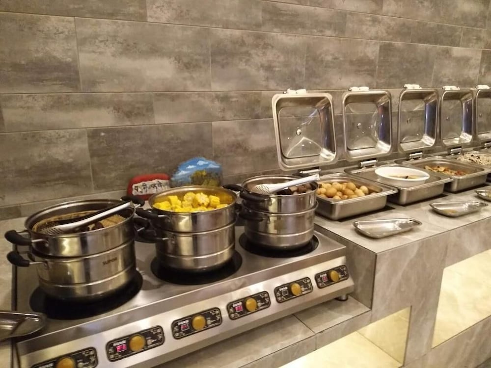 Фото Ramada Encore DaochengYading