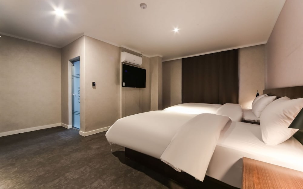 Фото Geojedo Jangseungpo Hotel Carara