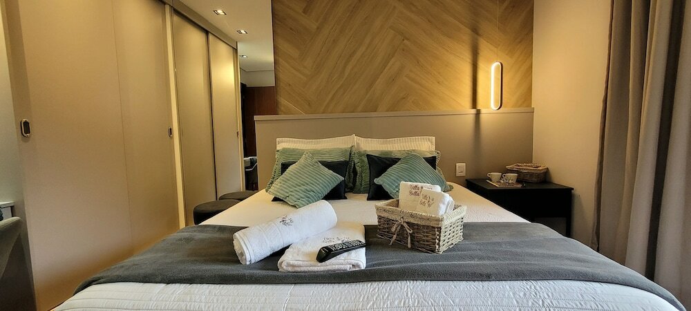 Фото Dúplex Luxo com Piscina Aquecida, Lareira e Wifi