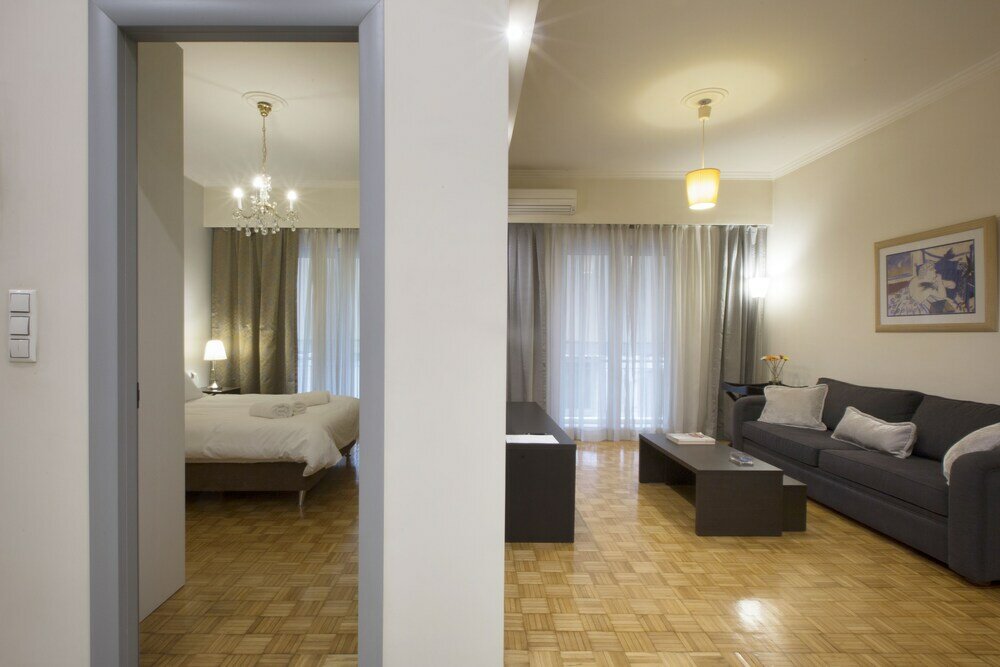 Фото Koukaki Deluxe Apt at Syggrou-Fix