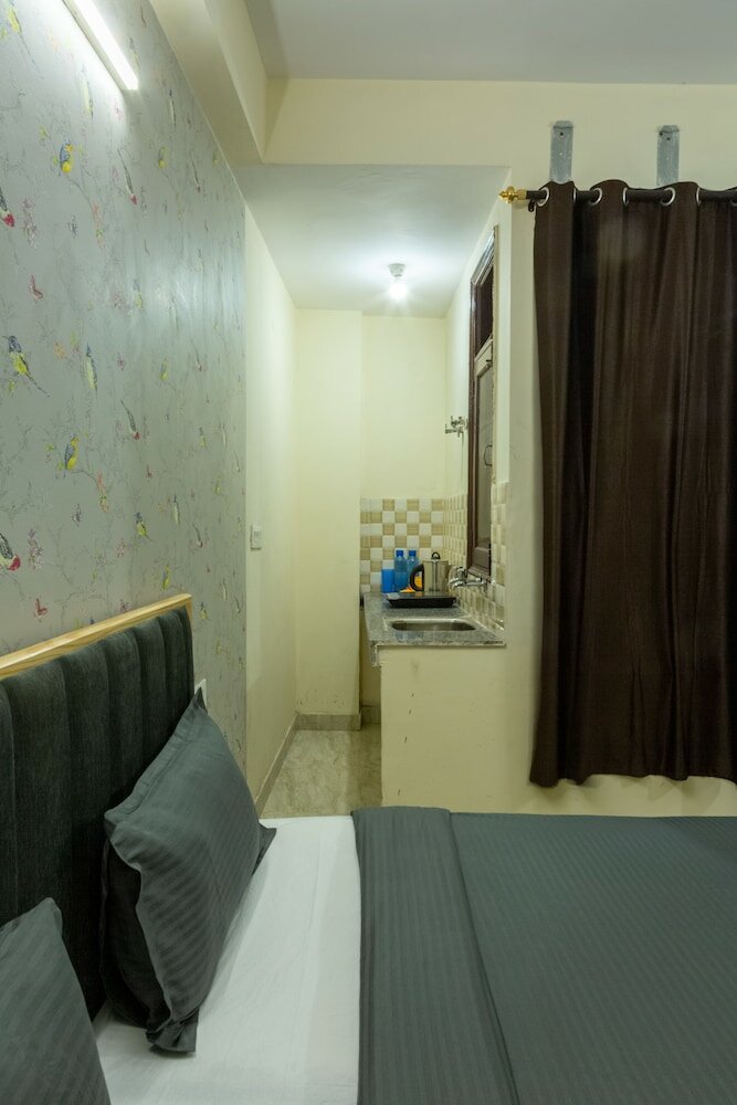 Фото Eat Sleep Wander Studio Apartments