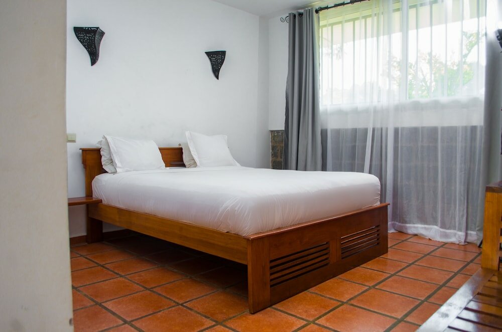 Фото Ikopa Hôtel