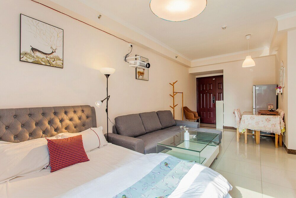 Фото FeiEr Apartment