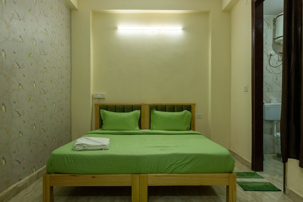 Фото Eat Sleep Wander Studio Apartments