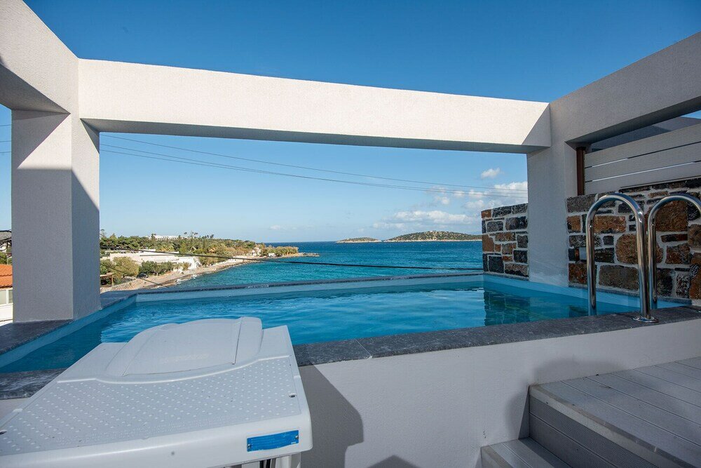 Фото Ammos Luxury Suites