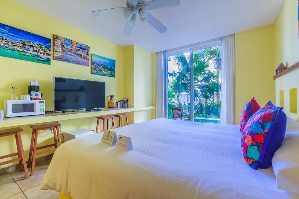 Фото Beautiful Ground Floor Two Bedroom Suite at Ixchel