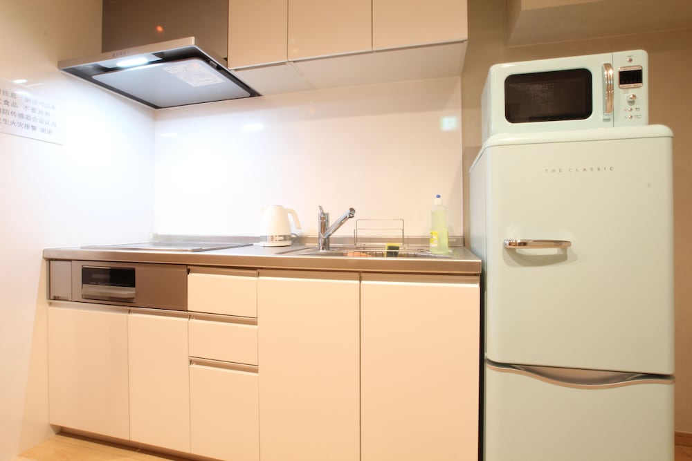 Фото Shimanouchi Luxury Apartment