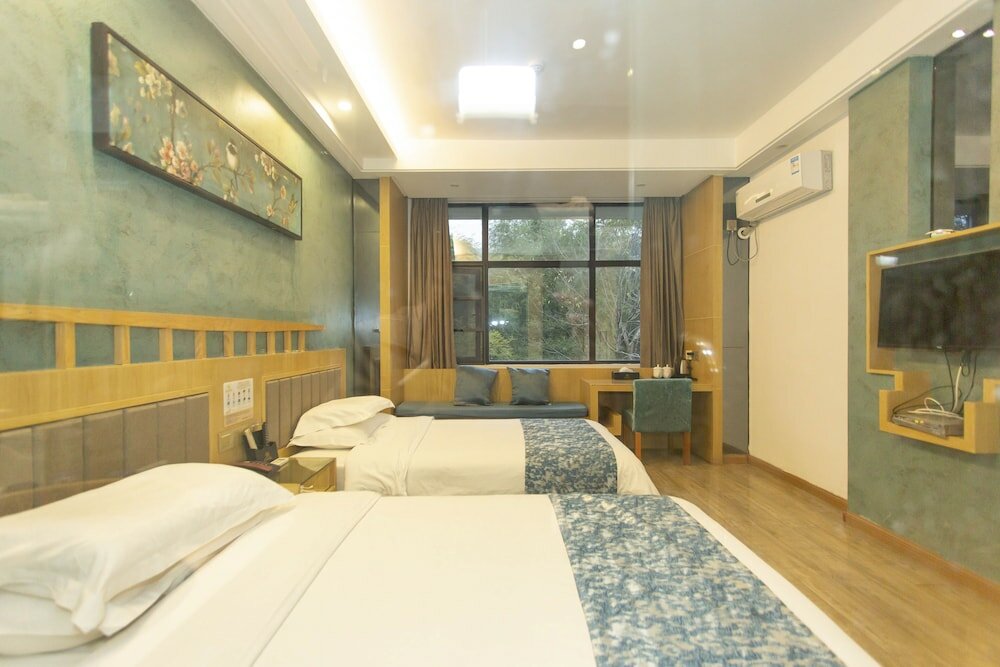 Фото Zhangjiajie Yunqi Inn