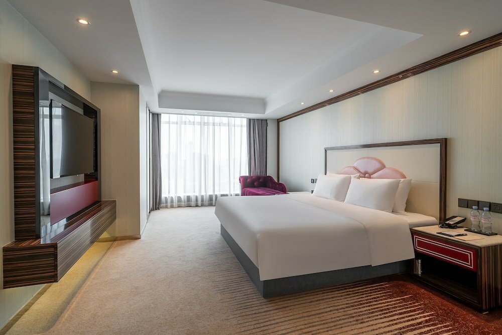 Фото Suning Universal Hotel All-Suites