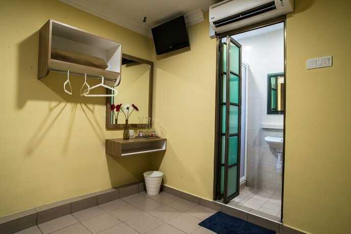 Фото Oyo 615 Dragon Inn Premium Hotel