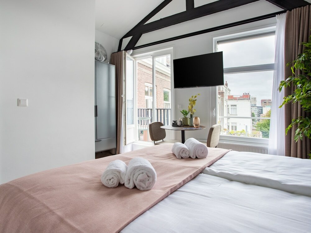 Фото Limehome Amsterdam Hemonystraat