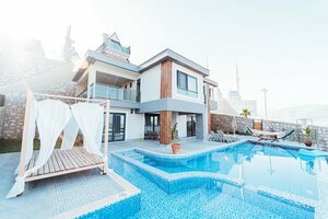 отель Fortunella Suites & Villas