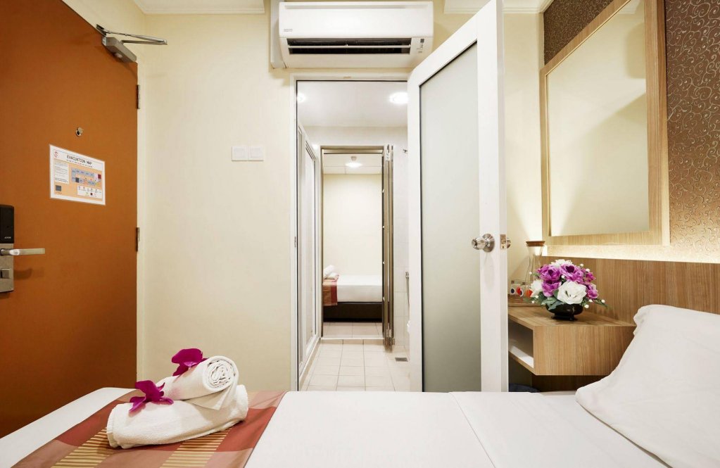 Фото Oyo 615 Dragon Inn Premium Hotel