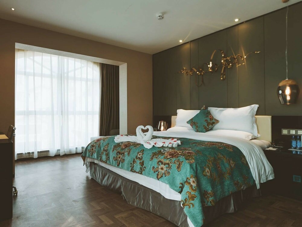 Фото Tulip Inn Huaxi Hotel - Guiyang