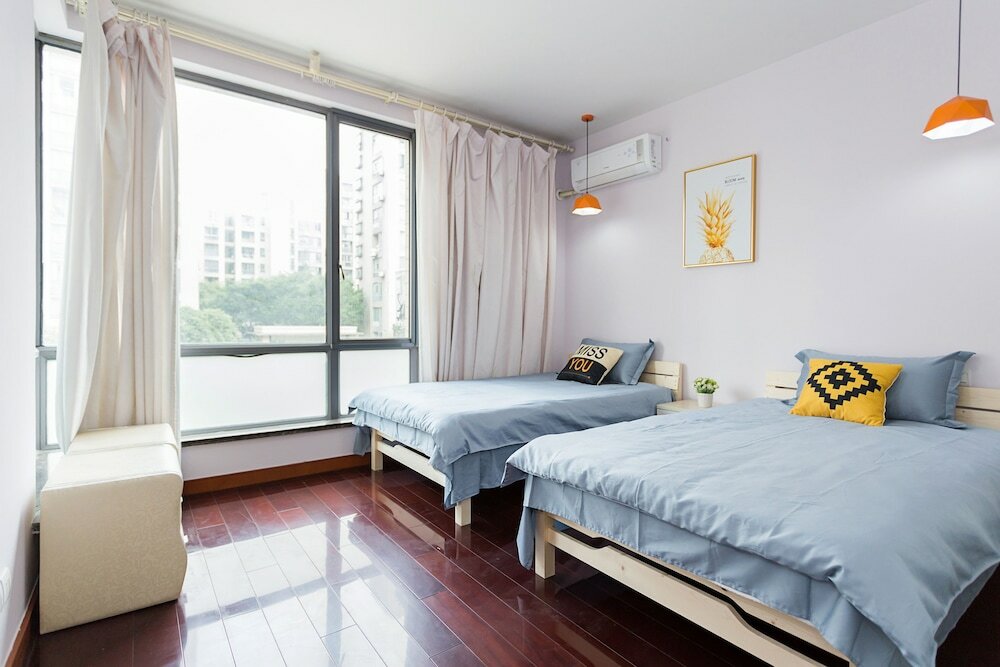 Фото Good Time Travellers Inn- Shanghai New International Expo Apartment