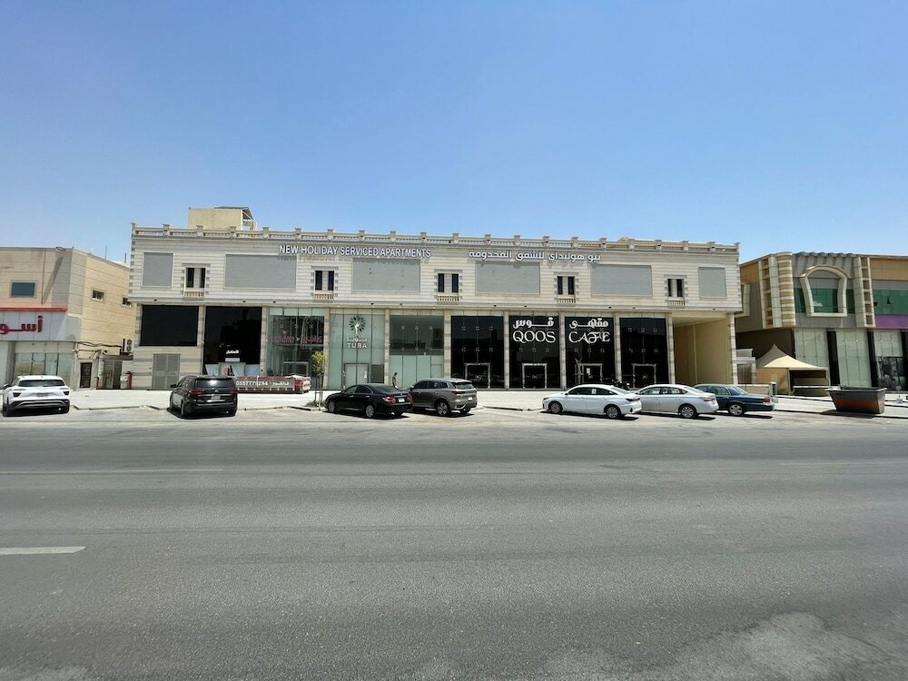 Фото New Holiday Serviced Apartments