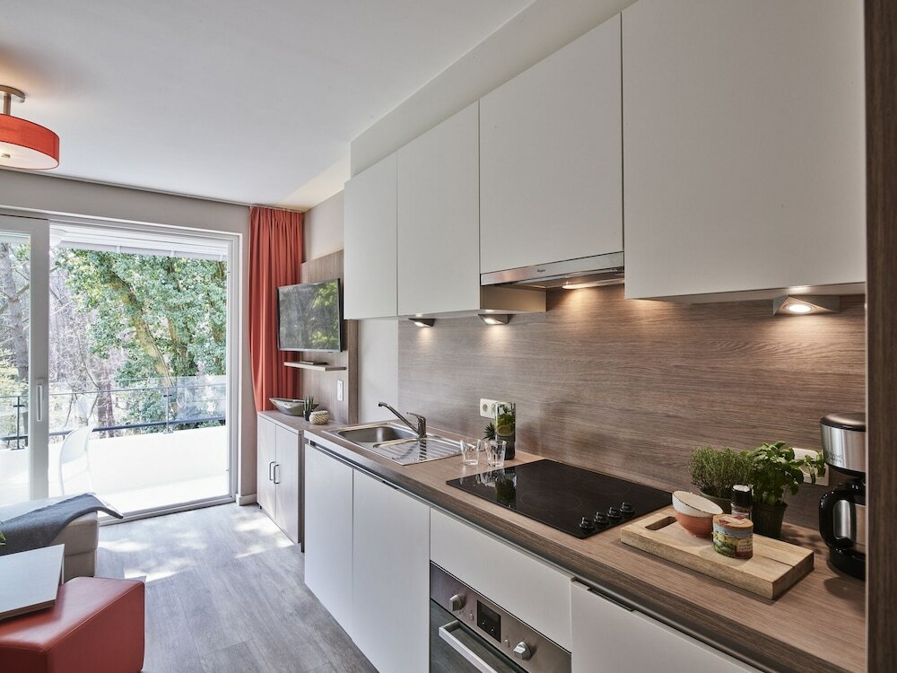 Фото Holiday Suites Limburg