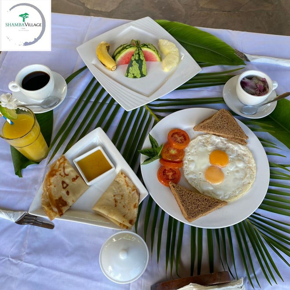 Фото Shamba Village Hotel