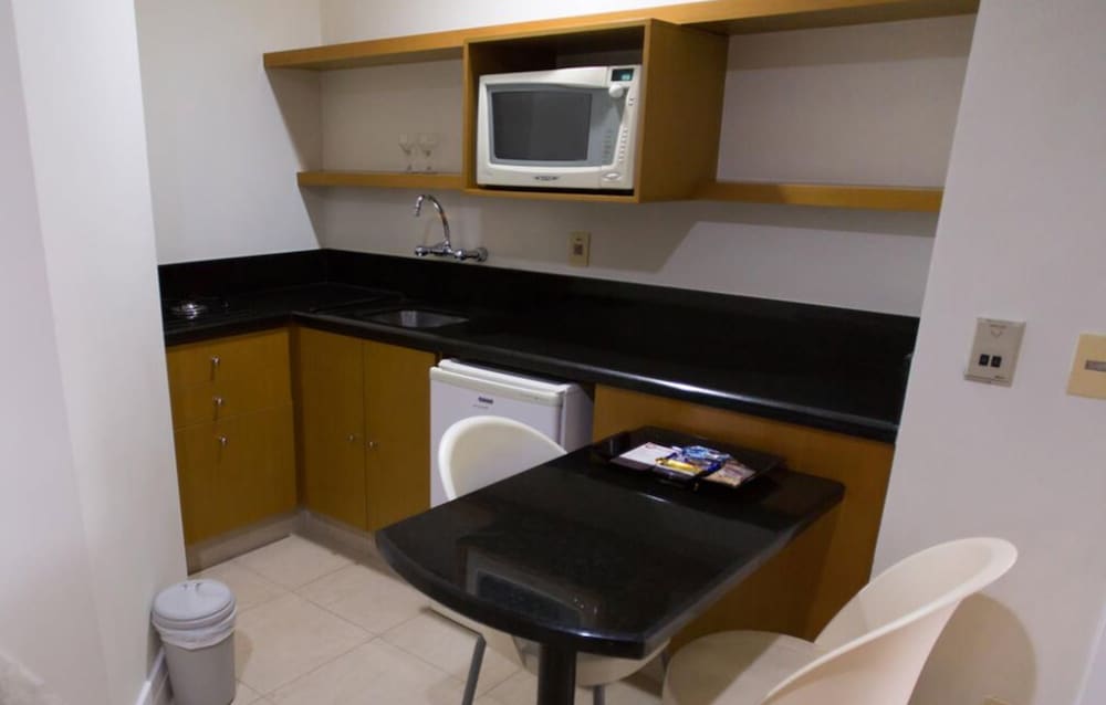 Фото Le Village Flats Hotel e Business