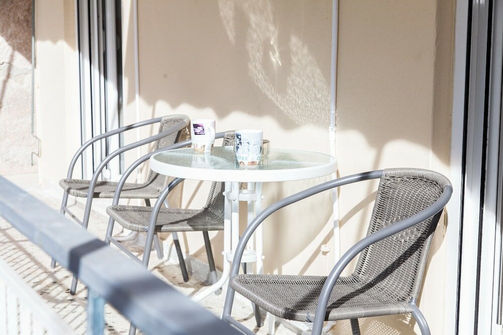 Фото Cozy apartment n Stavros Niarchos Park