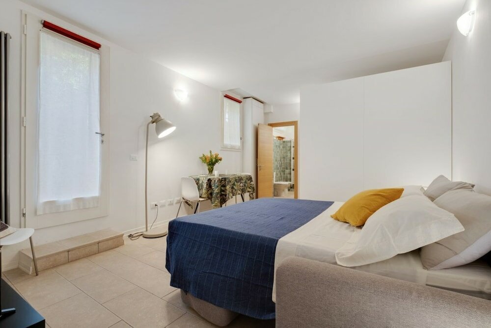 Фото VIA Santo Stefano Secret Garden Apartment