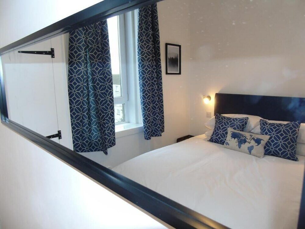 Фото Snug - Sealladh Mara Apartment