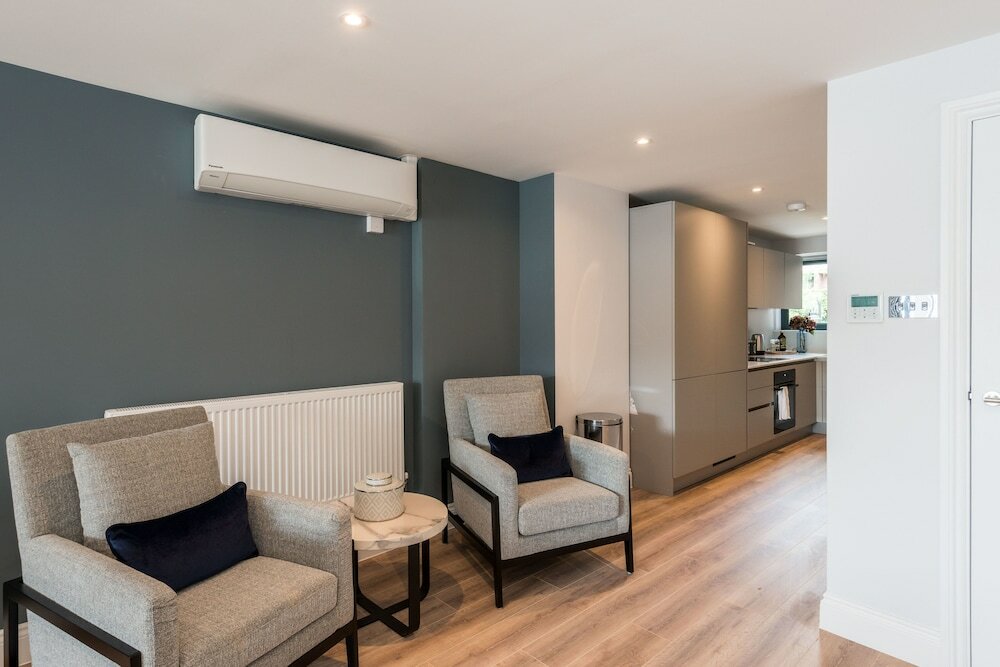 Фото The Carlyle - Elegant Serviced Apartments