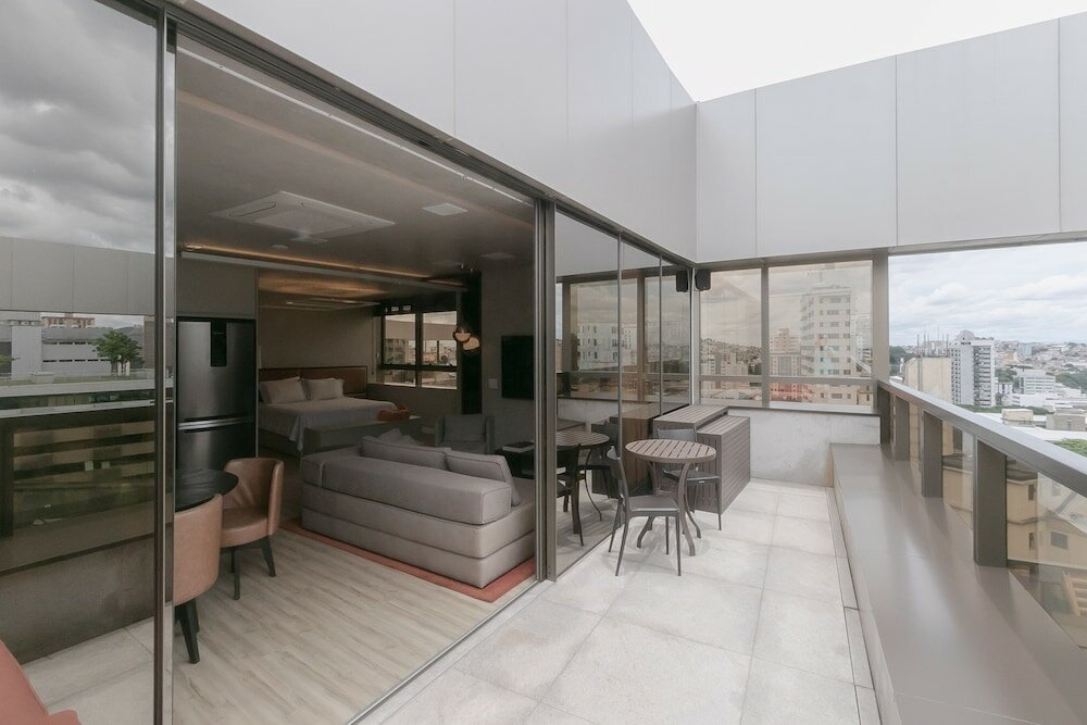 Фото Loft alto padrão com varanda