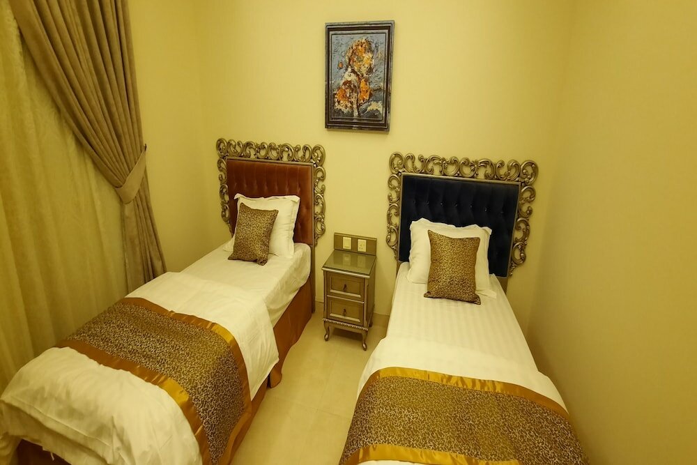 Фото The Blue Rose Hotel - الورده الزرقاء للوحدات السكنيه