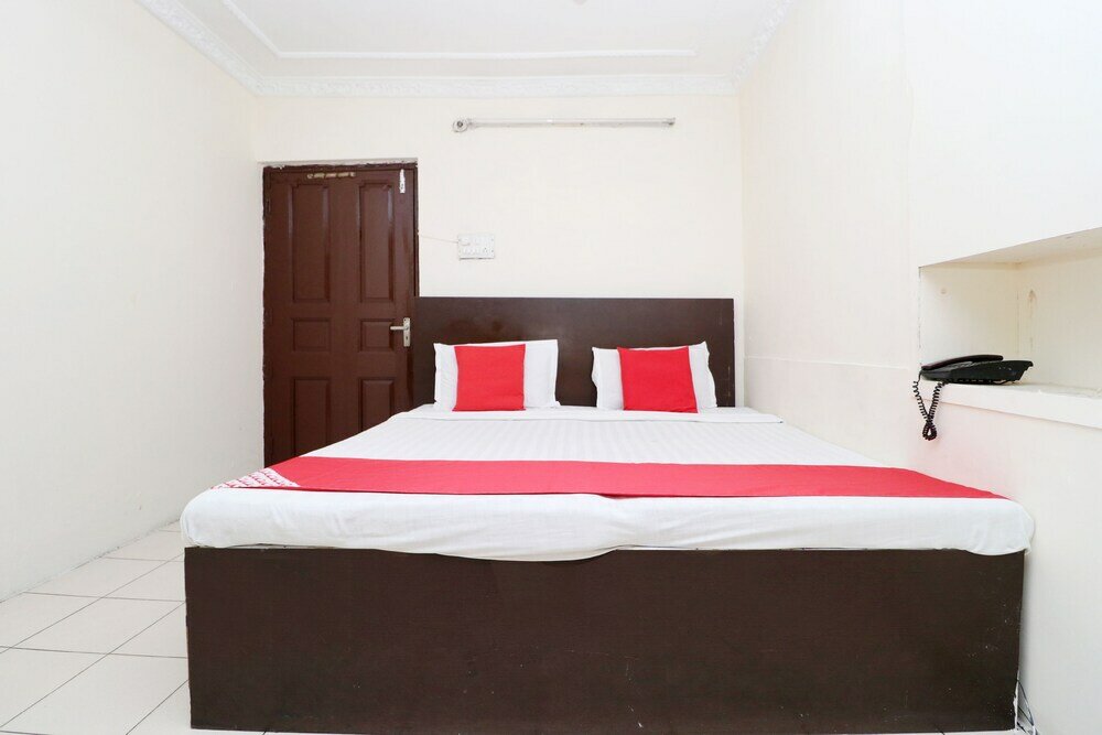 Фото Oyo 30274 Temple City Guest House